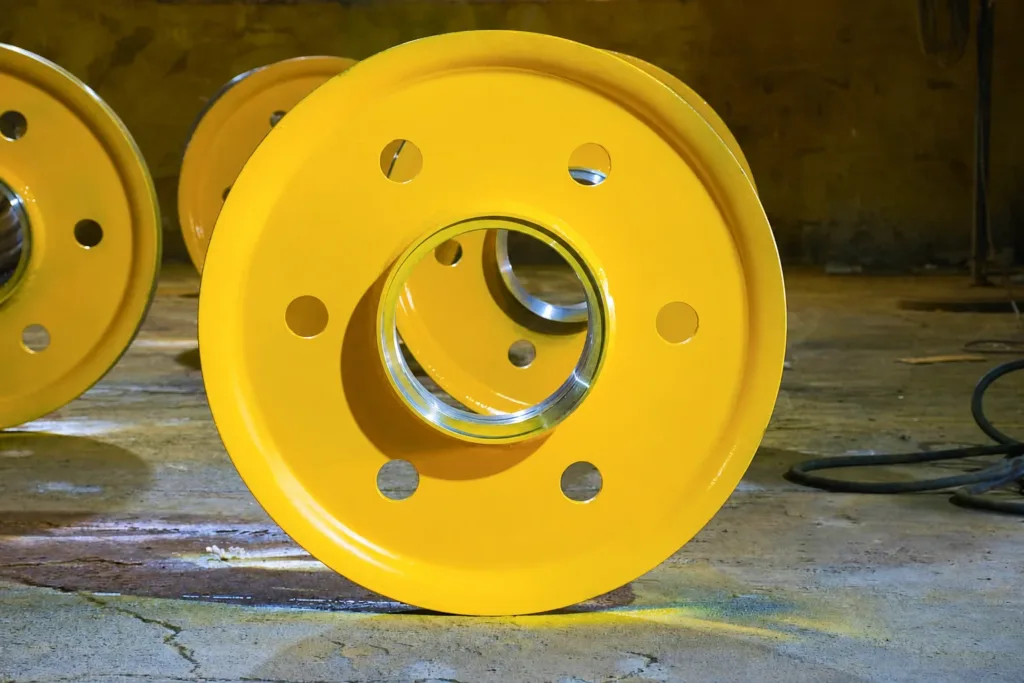 Crane sheaves showing rope flanges and machined central bores