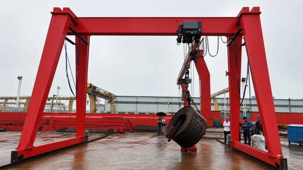 Full gantry crane operating in an outdoor material handling yard