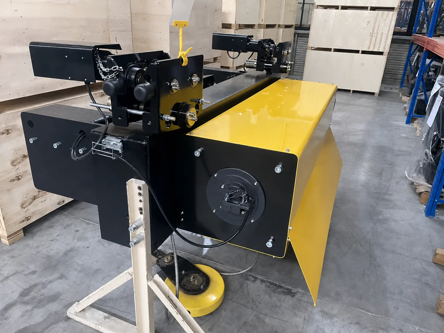 Finished electric wire-rope hoist with high-lift rope drum, trolley wheels and protective guards