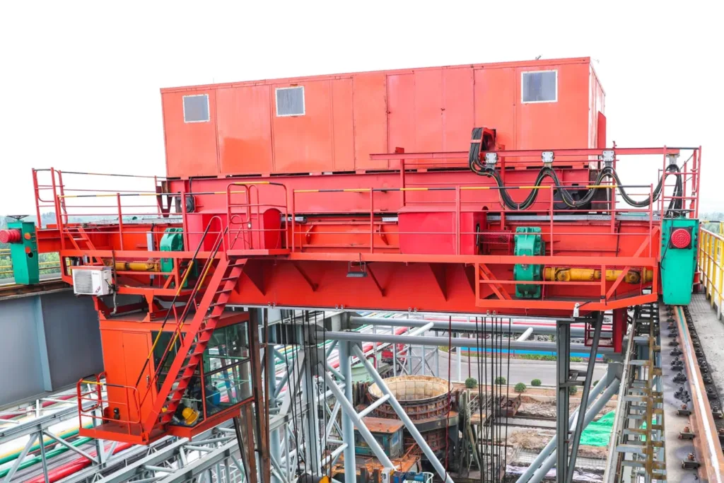 Large enclosed process crane integrated above a production vessel