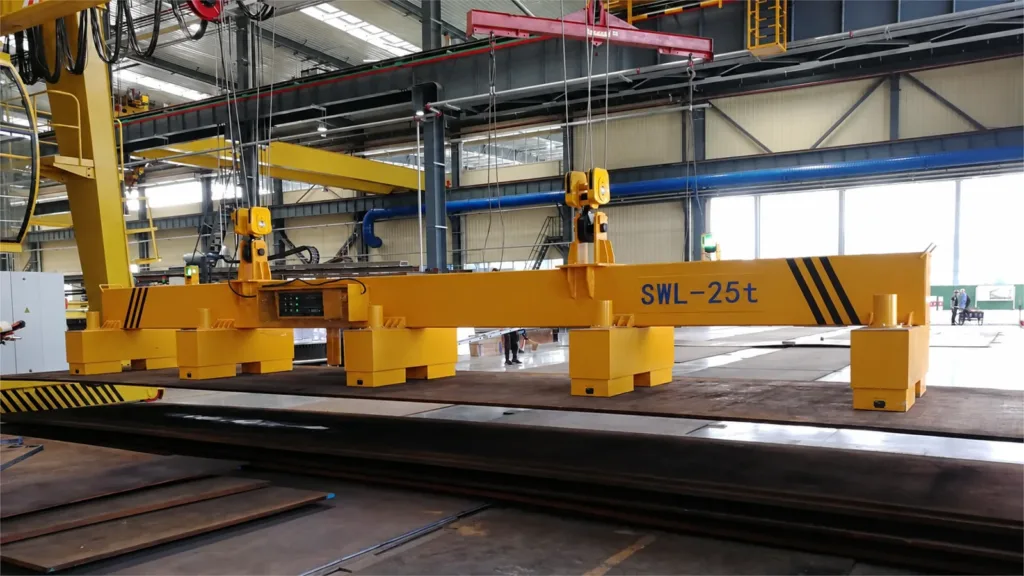 Electro-permanent magnetic lifting beam over a steel plate