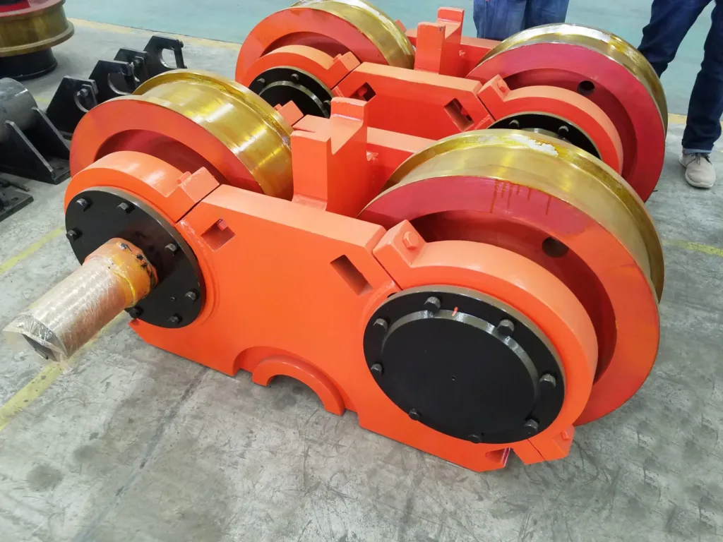 Wheel-and-shaft assemblies with split bearing housings