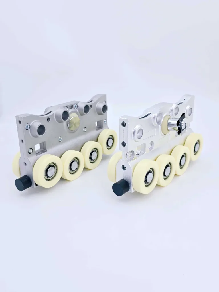 Two multi-wheel trolleys for an enclosed aluminium track system